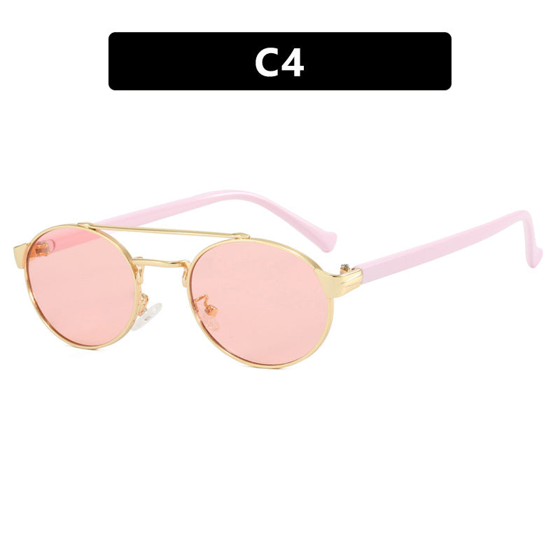 Women's fashionable sunglasses in stylish round design with gold accents Skanto