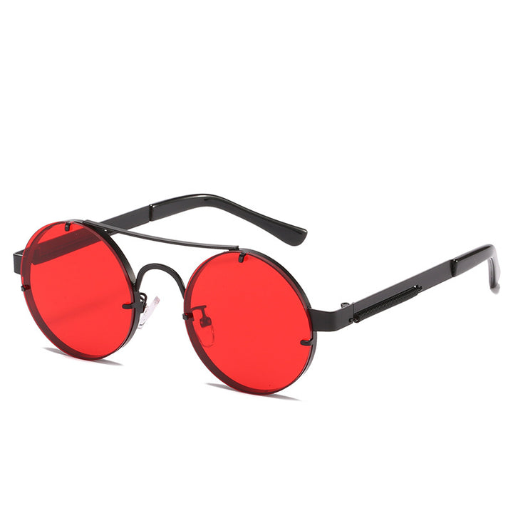 Dame rund designer solbrille med innovativ metallramme og beskyttende linser Skanto