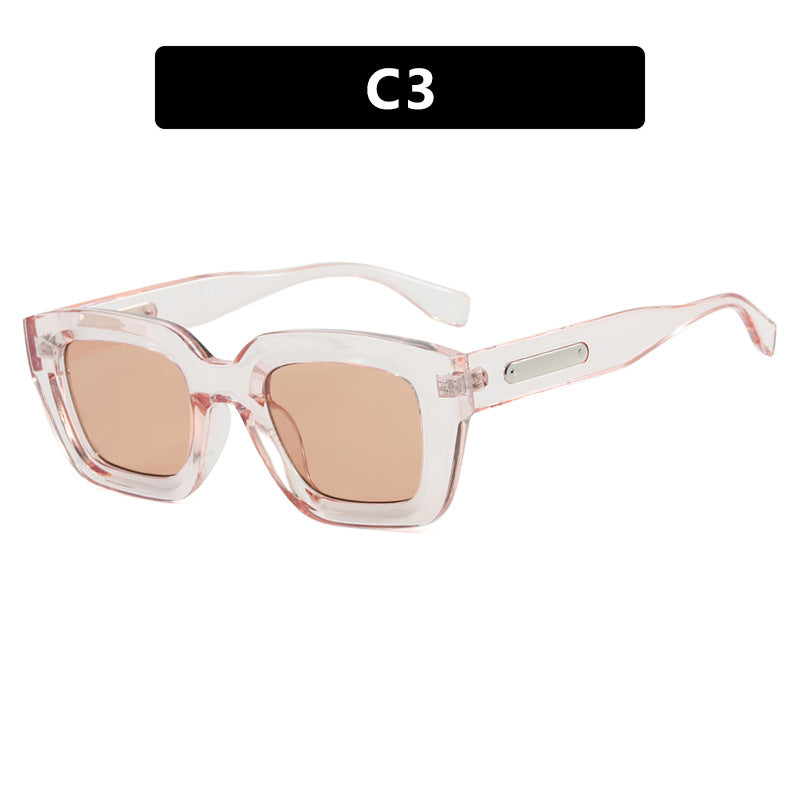 Dame kvadratisk solbrille med gjennomsiktig ramme og brune glass Skanto