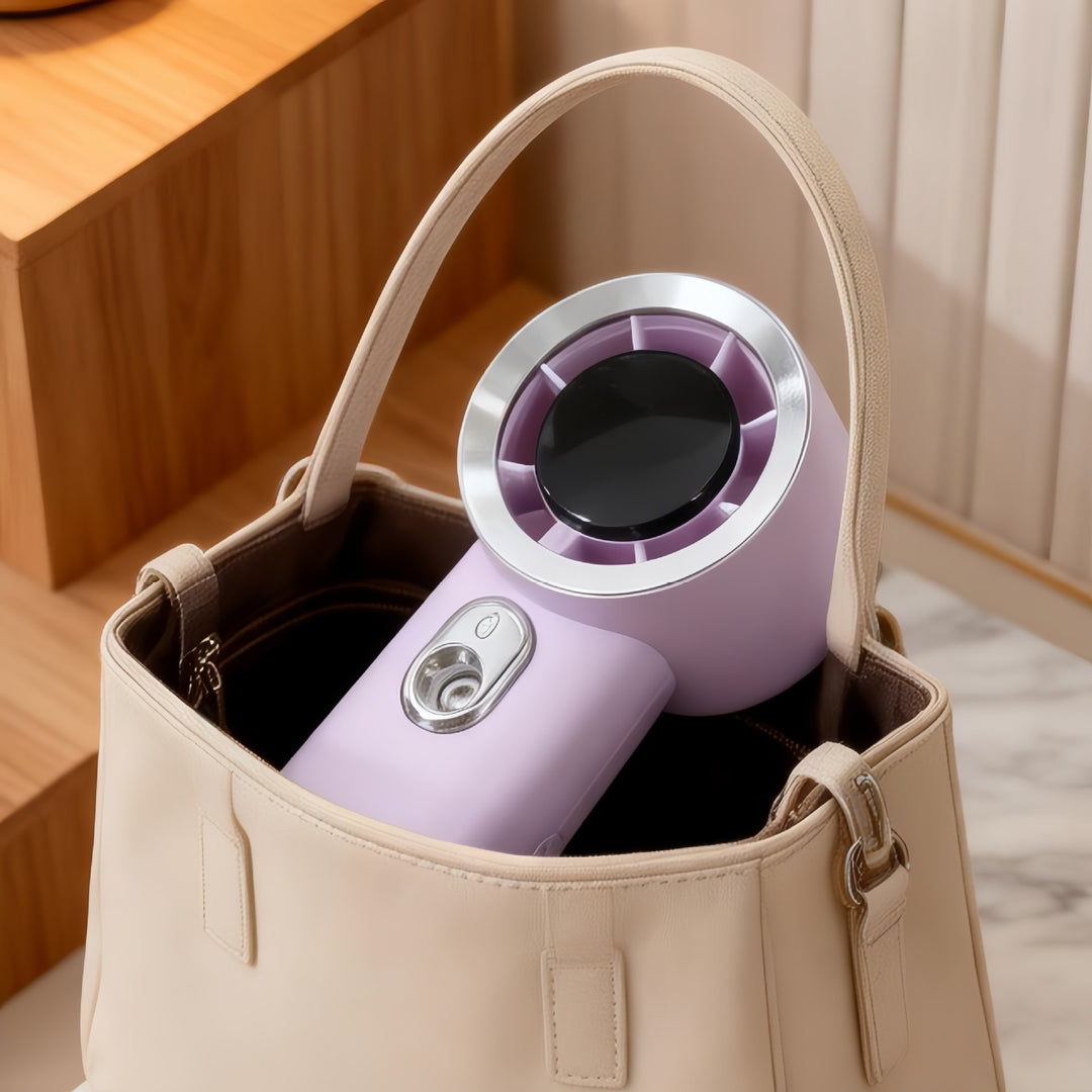 Dame bærbar mini sprayvifte med ergonomisk design Skanto