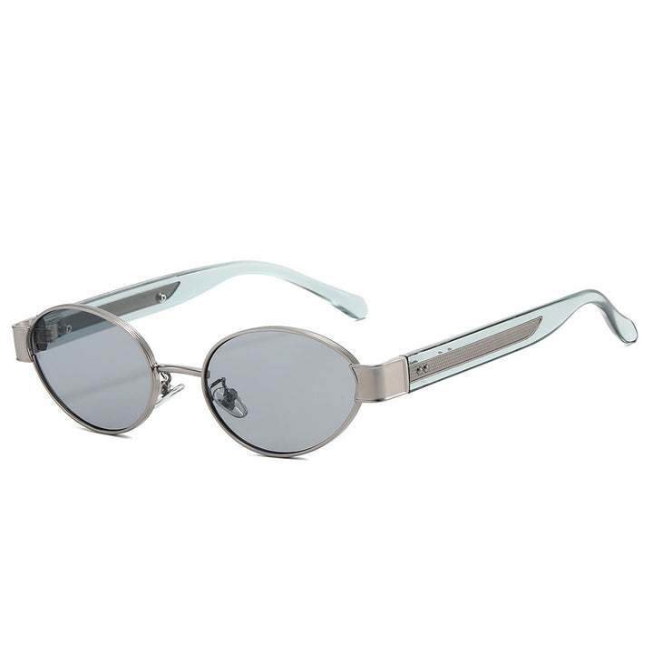 Dame solbrille i moderne, ovale ramme med harmonisk fargekombinasjon Skanto
