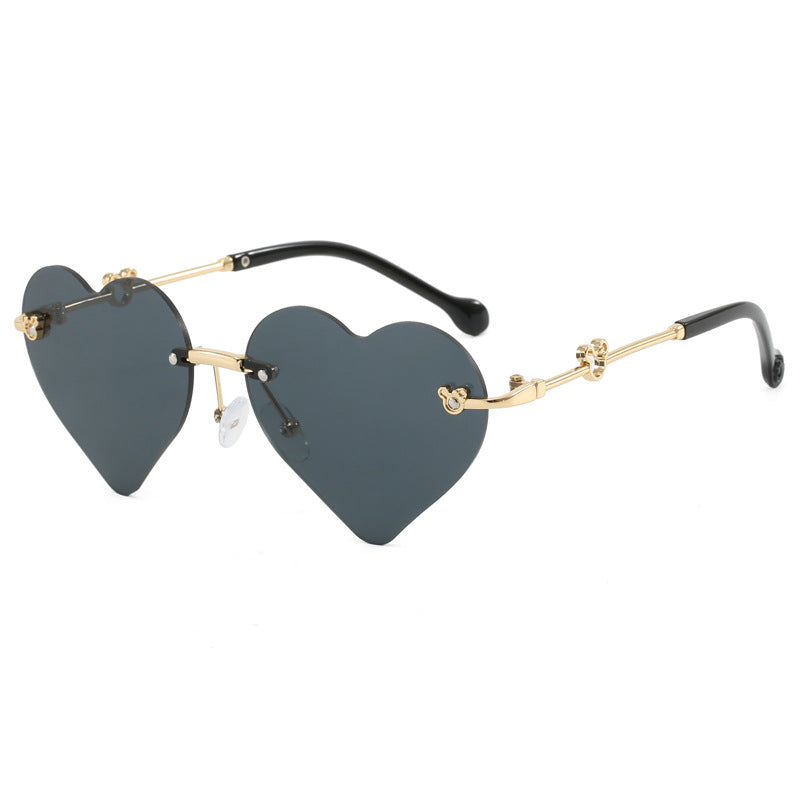 Dame hjerteformet solbrille med speilende linser Skanto