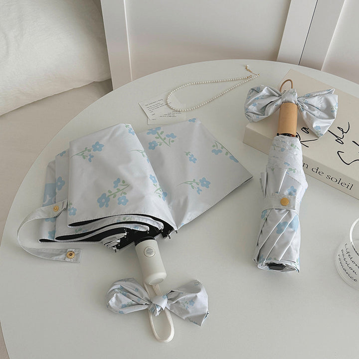 Damer Faltende Paraply med stilfullt blomsterdesign Skanto