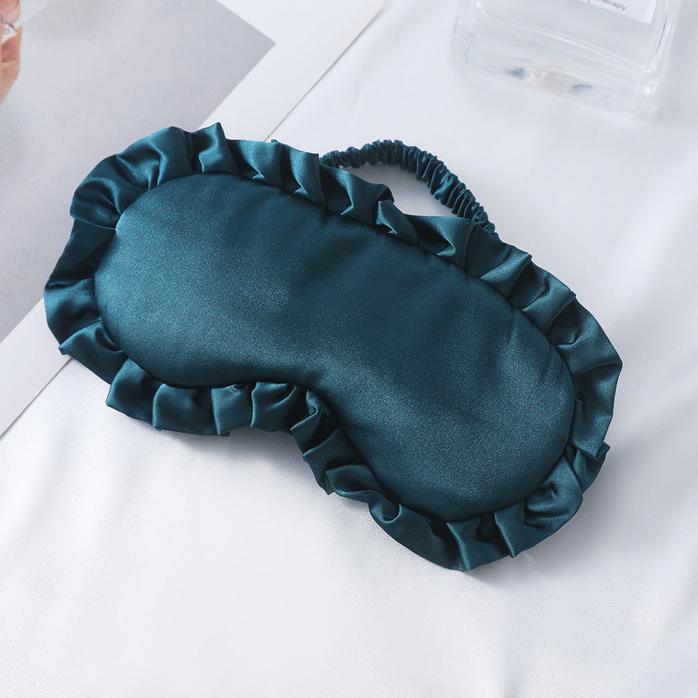 Dame nan satin-glinsende øyemaske med ergonomisk kontur, volangkant og myk polstring Skanto