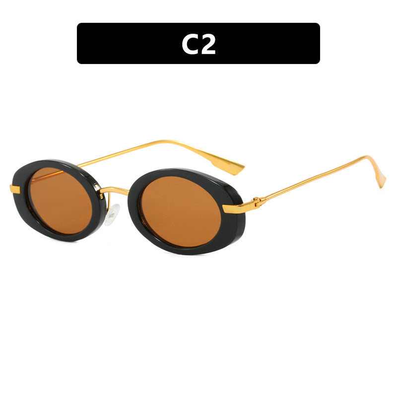 Dame moteriktig solbrille i elegant ovalt design Skanto