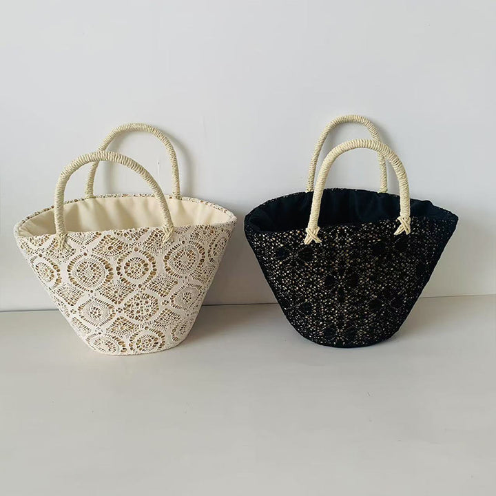 Kurvveske med elegant, flettet design Skanto