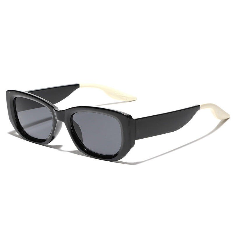 Dame fashionable luksus solbrille med kantet design Skanto