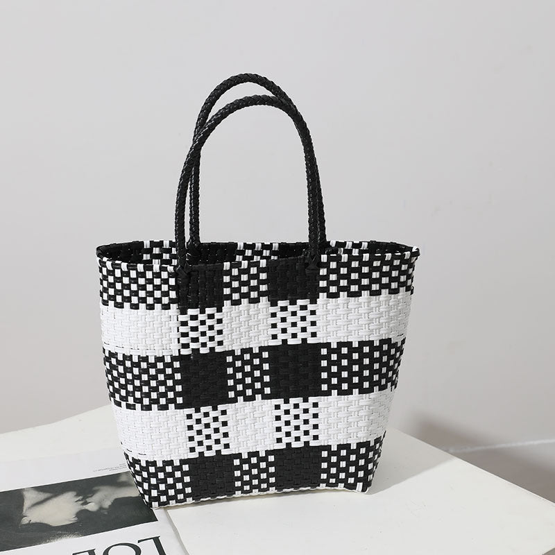 Handmade basket bag in modern plaid pattern Skanto