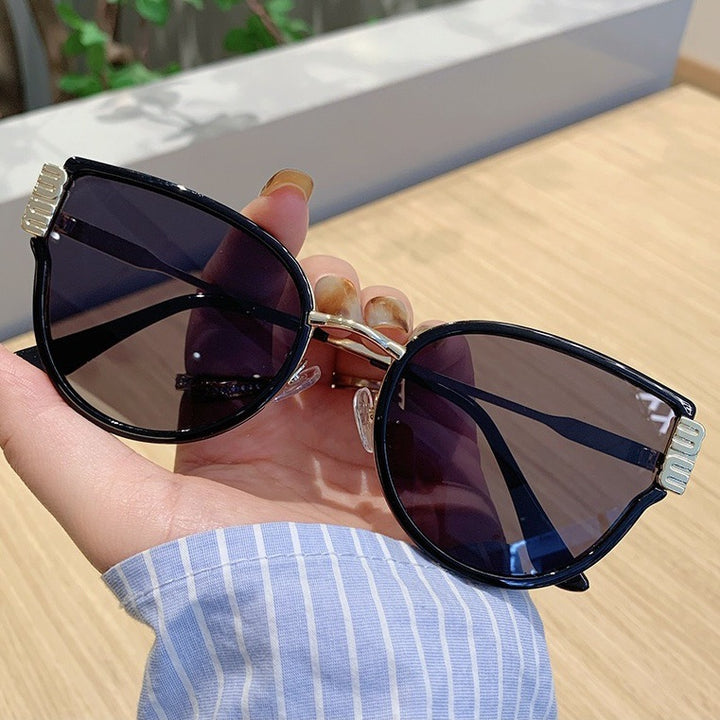 Damer Cat-Eye solbriller med elegante fremhevede linser Skanto