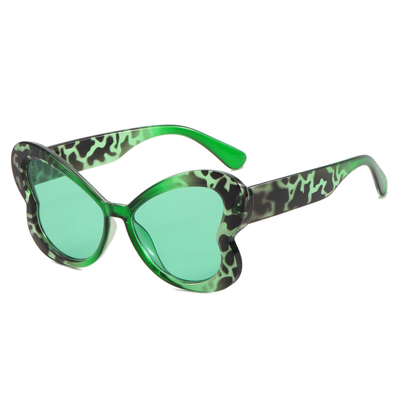 Dame Oversized-solbrille i leken sommerfugl-design Skanto