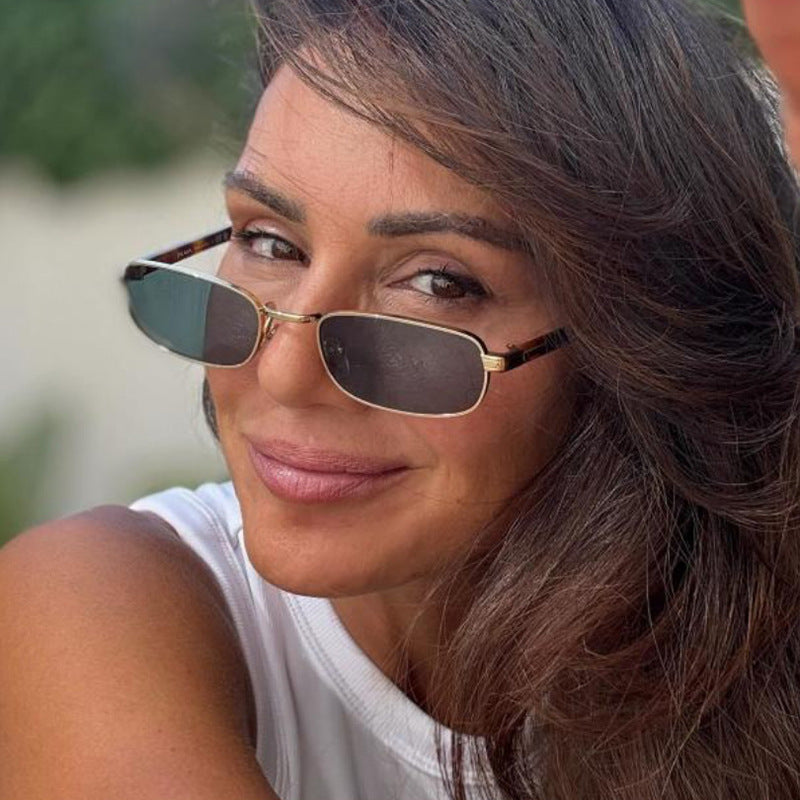 Women's fashionable sunglasses with stylish metal frame and orange lenses Skanto