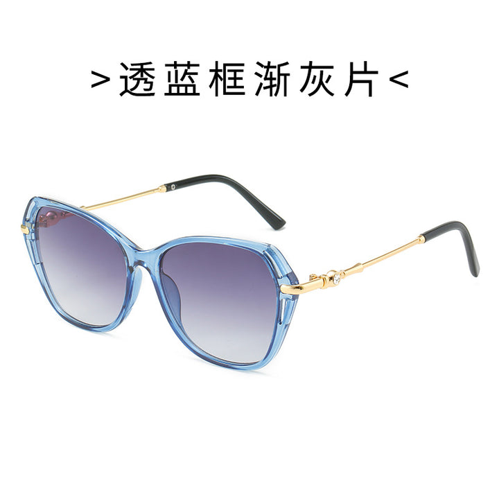 Dame moter Cat-Eye solbrille med elegant metallramme Skanto