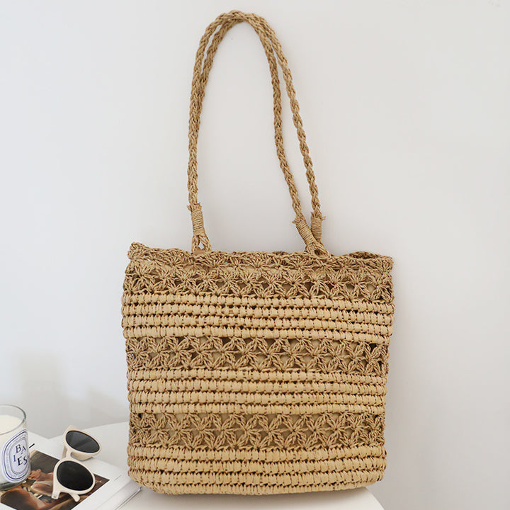 Hand-knotted beach bag in modern net design Skanto
