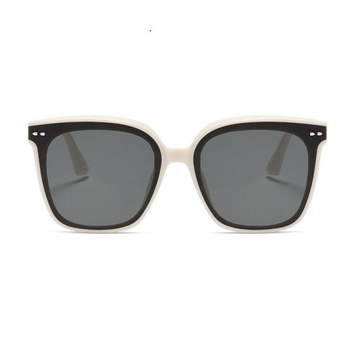 Dame oversized solbrille med moderne, kontrasterende design Skanto