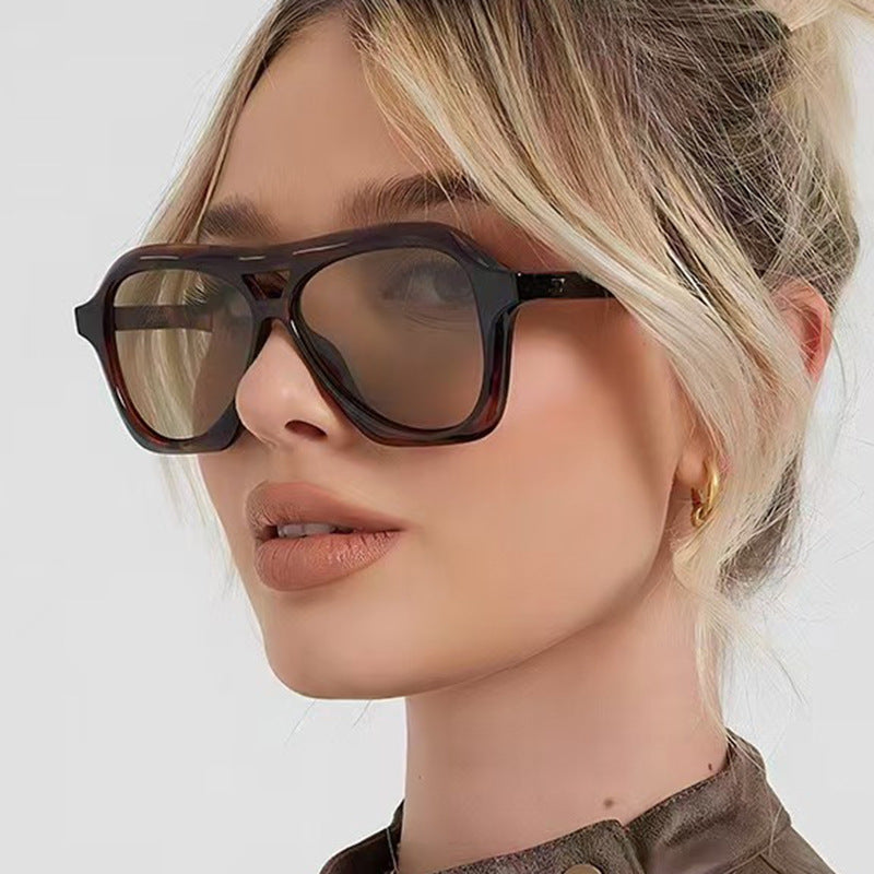 Women's fashion sunglasses in innovative design with wide frame Skanto