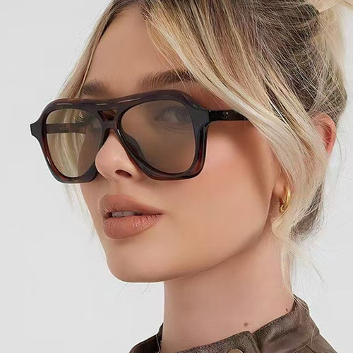 Women's fashion sunglasses in innovative design with wide frame Skanto