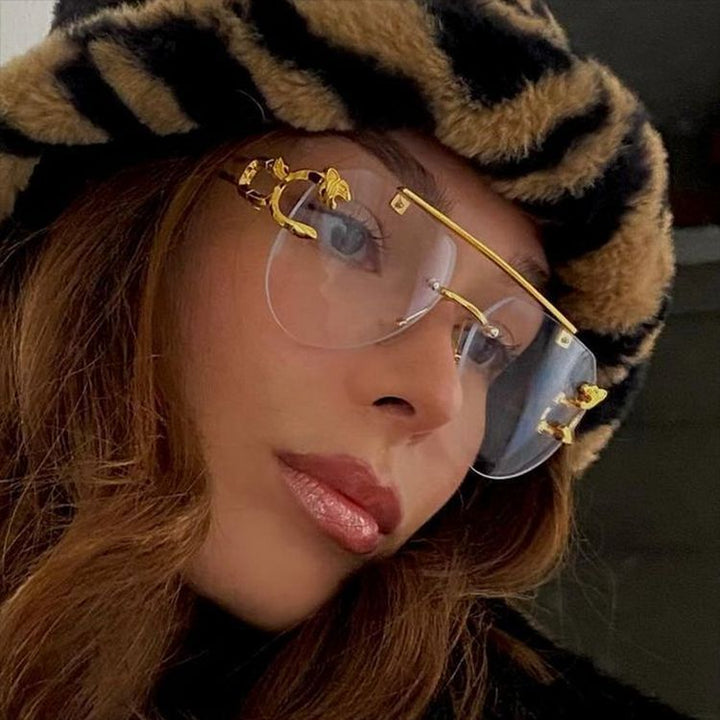 Women's unusual round sunglasses with decorative details Skanto