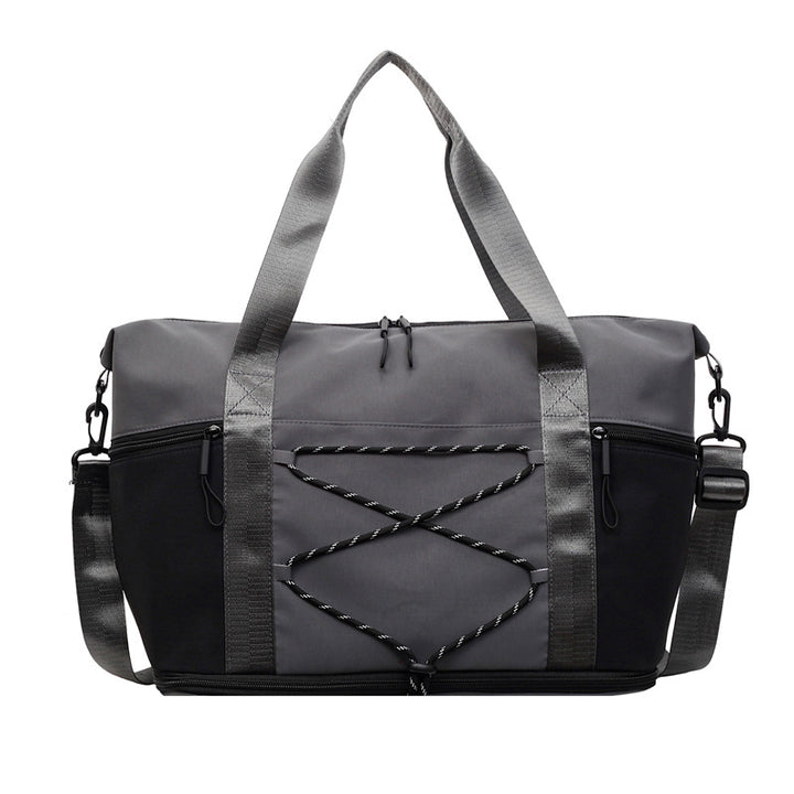 Sporty skulderveske med praktisk organizer Skanto