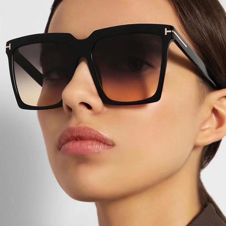 Dame oversized solbriller med elegant og polariserende glassdesign Skanto