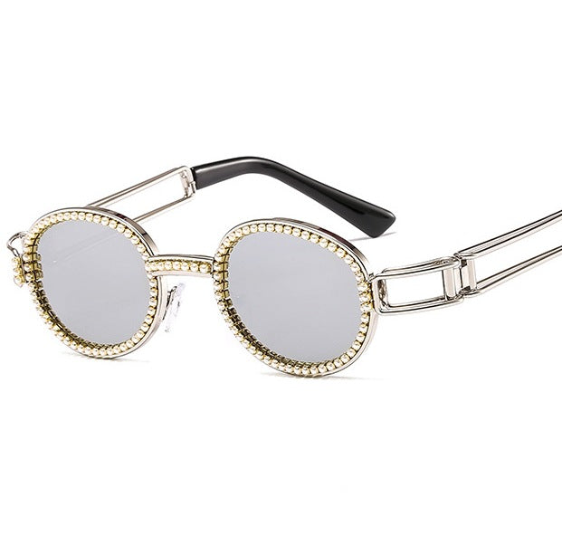 Dame moteriktig solbrille med glamorøs ramme Skanto