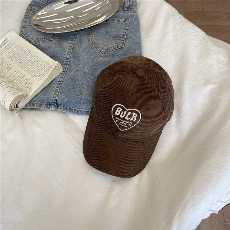 Kvinnens teksturerte kordfløyels baseball cap Skanto