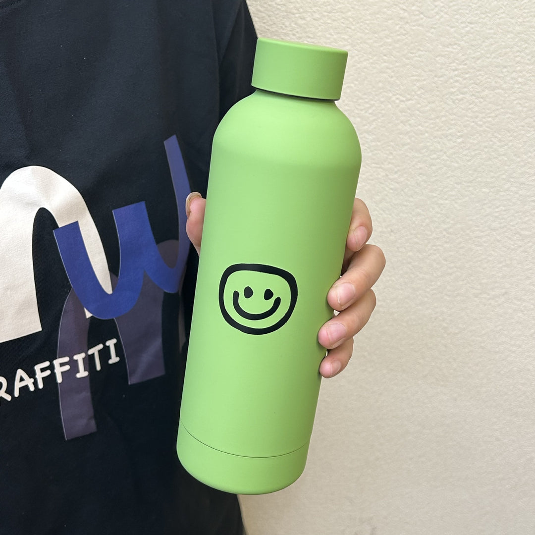Dame isolasjonsflaske med glad smiley-design Skanto