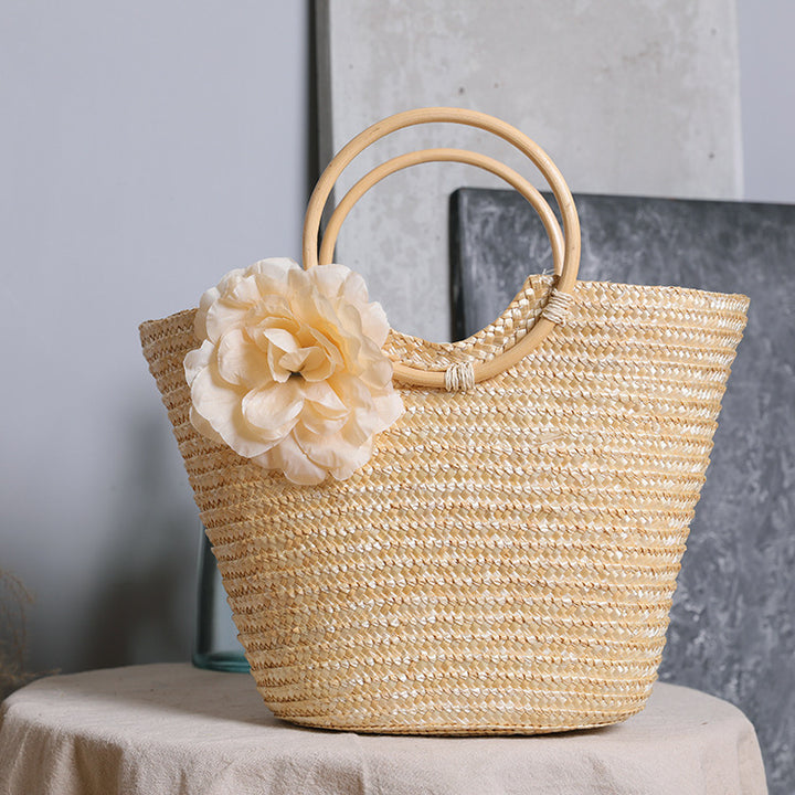 Håndveske med blomsterdetaljer Skanto