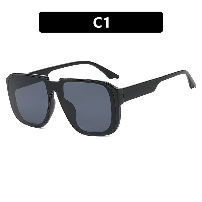 Women's trendy square sunglasses with transparent green frame and protective UV filter Skanto