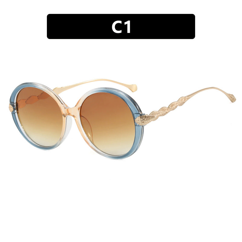 Women's large round sunglasses with decorative metal accents Skanto