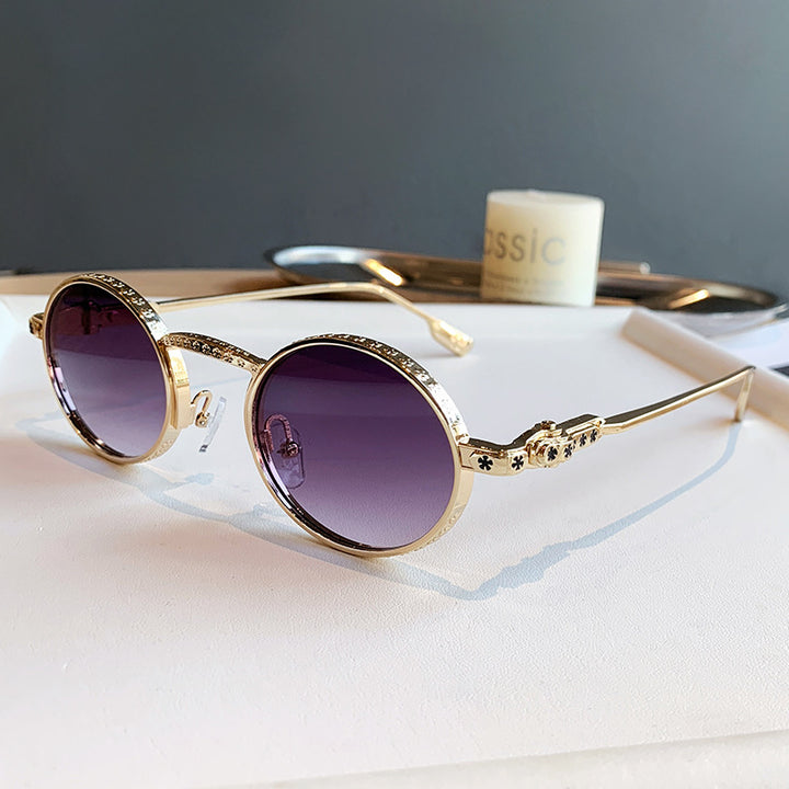 Dame Elegant solbrille med filigran detaljer Skanto