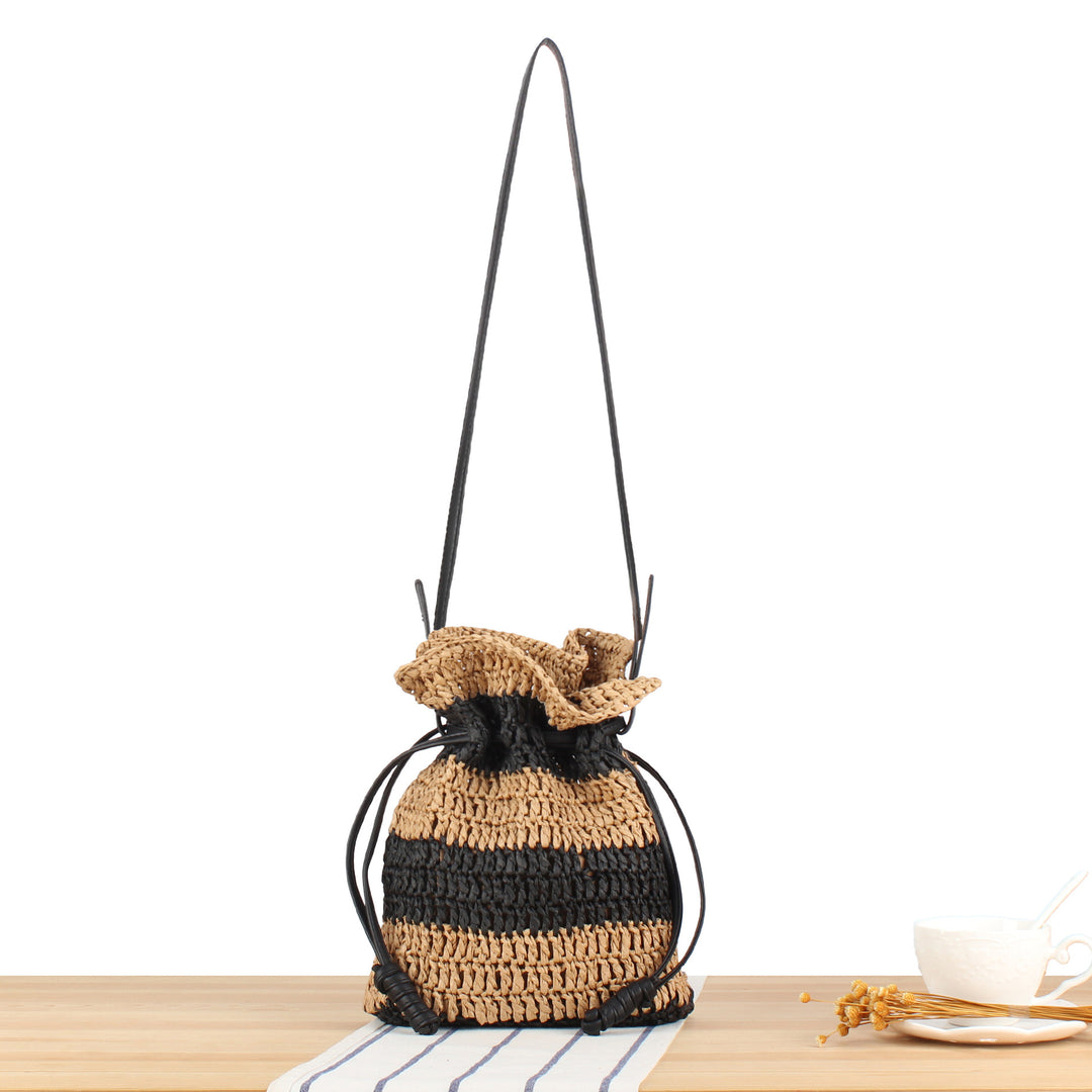 Handbag made of handmade natural fiber blend with modern drawstring closure Skanto