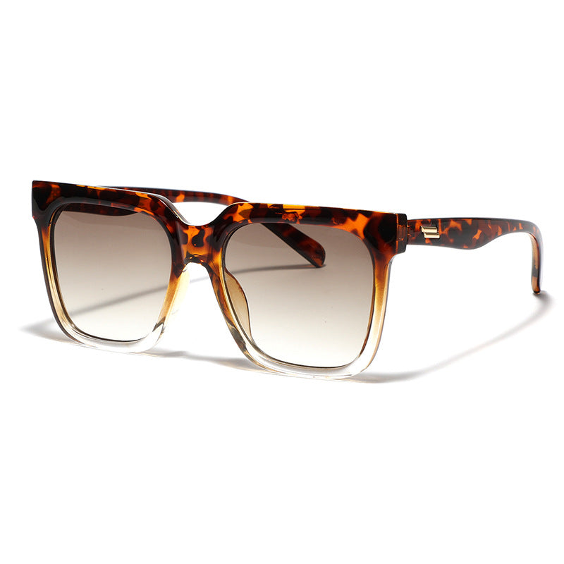 Dame firkantet solbrille med elegant skjoldpadde-design Skanto