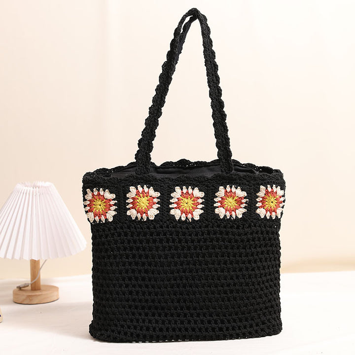 Hand-crocheted beach bag with floral accents Skanto