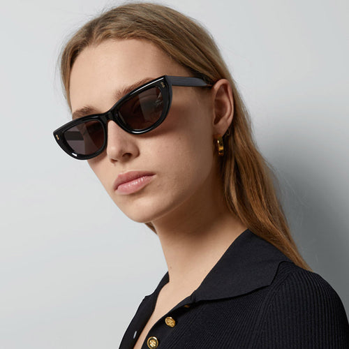 Dame Cat-Eye solbriller med transparent ramme og brune linser Skanto
