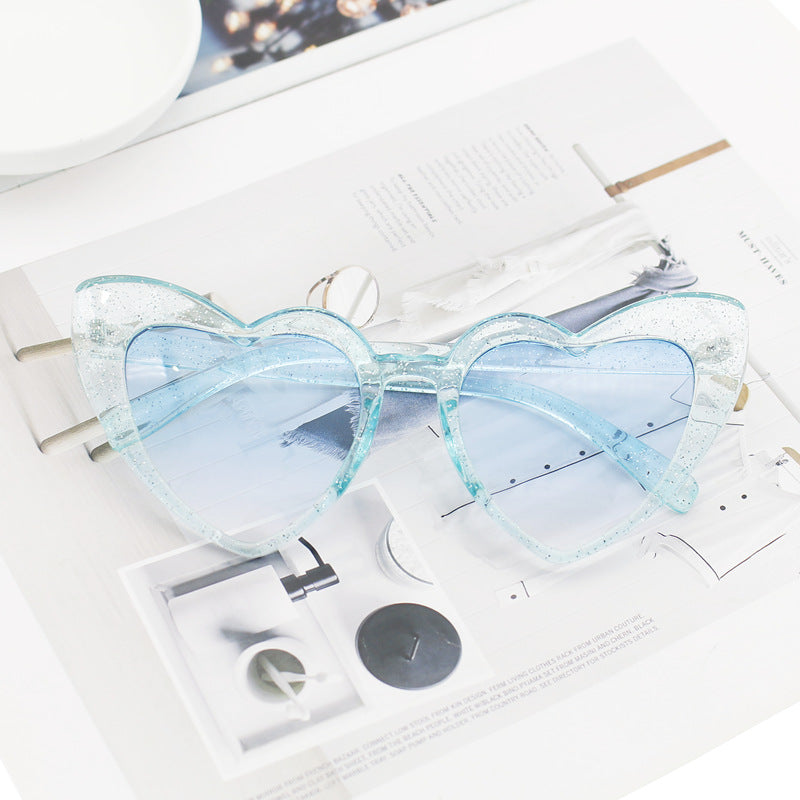 Dame hjerteformet solbrille med glitrende ramme Skanto