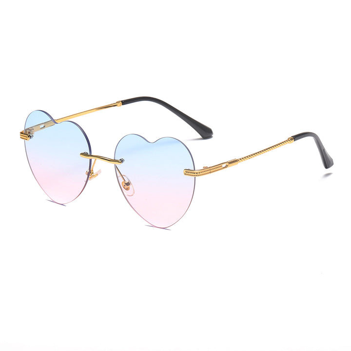 Dame hjerteformet solbrille med speilglass og gullramme Skanto
