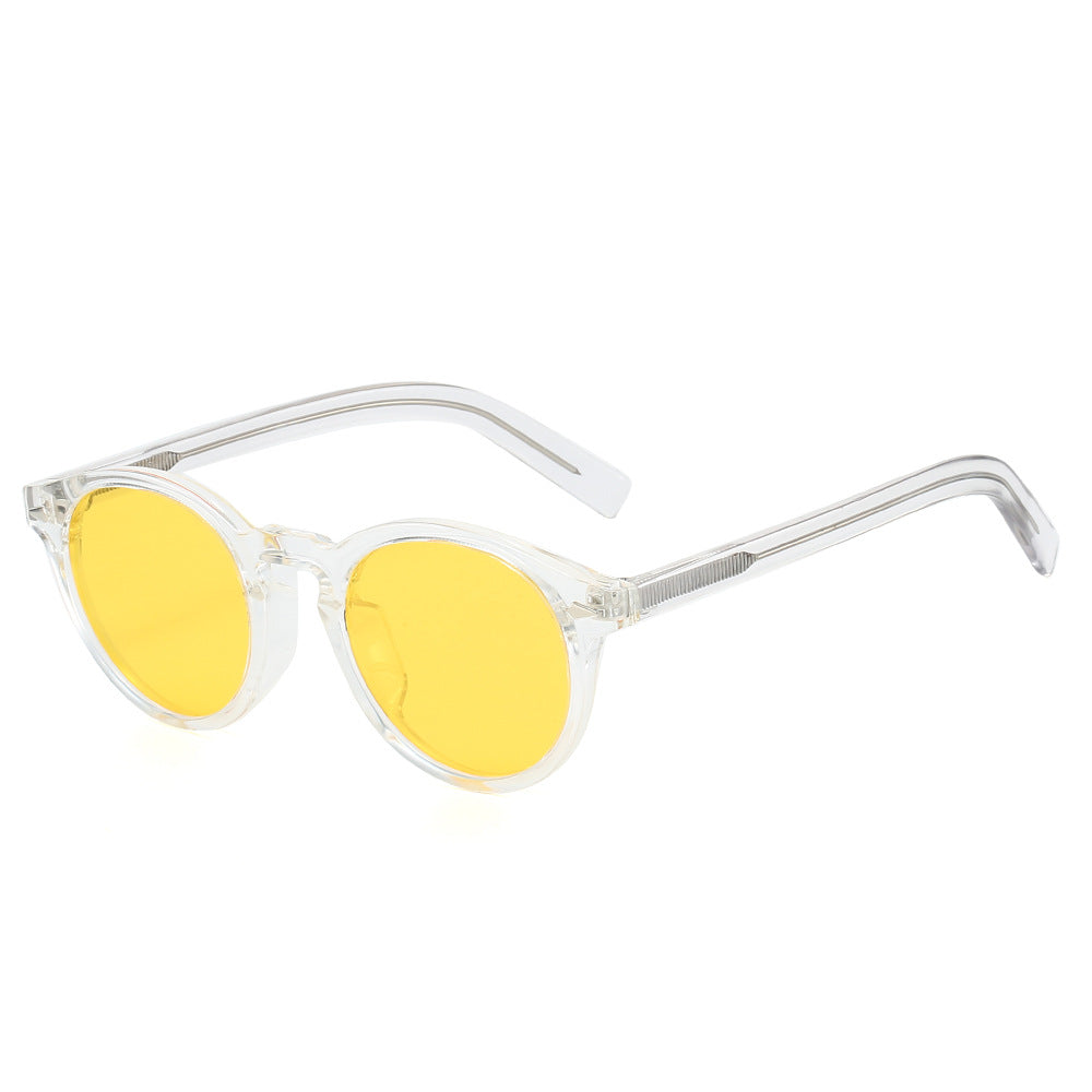 Dame trendy solbriller med transparent ramme og gule glass Skanto