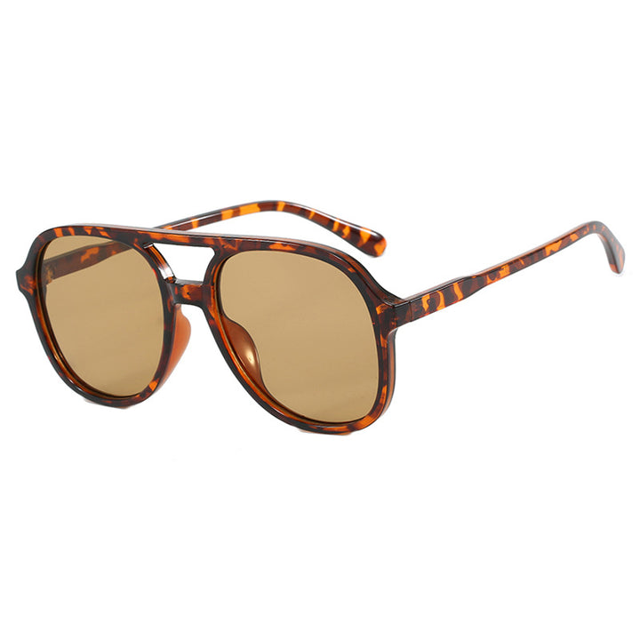 Dame solbrille med elegant skilpaddemønster og UV-beskyttelse Skanto