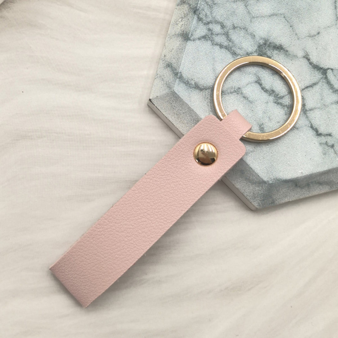 Unisex nøkkelring i høy kvalitet av kunstskinn med stiløs design Skanto