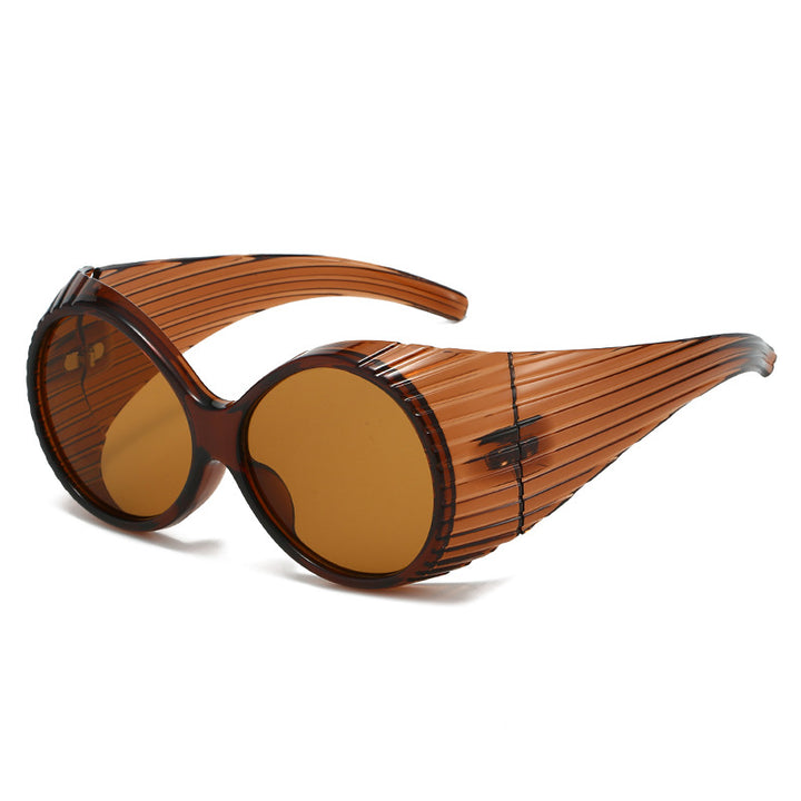 Dame Ekstravagant Solbrille med unikt bølgedesign Skanto