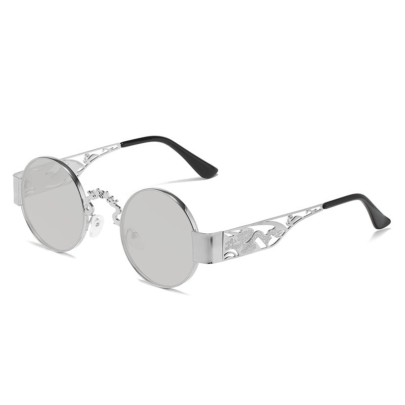 Dame kunstnerisk rundt solbrille med elegant filigranramme Skanto