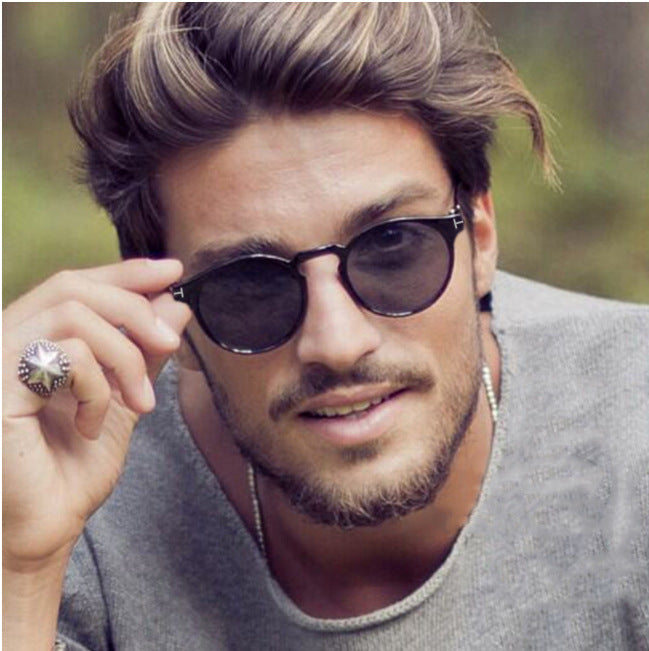 Dame moterik rund solbrille med elegant plastramme Skanto