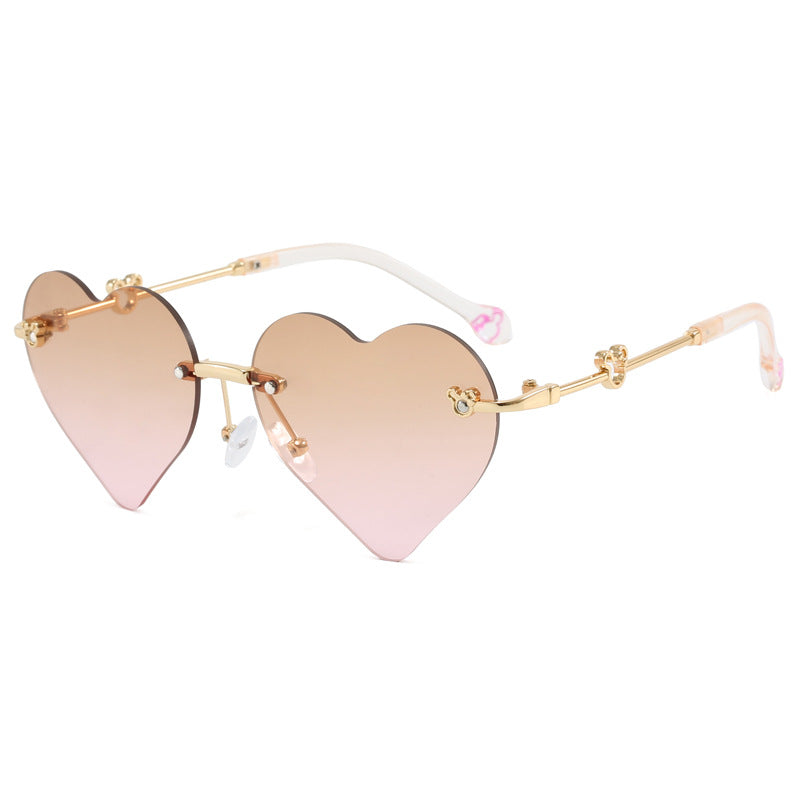 Dame hjerteformet solbrille med speilende linser Skanto