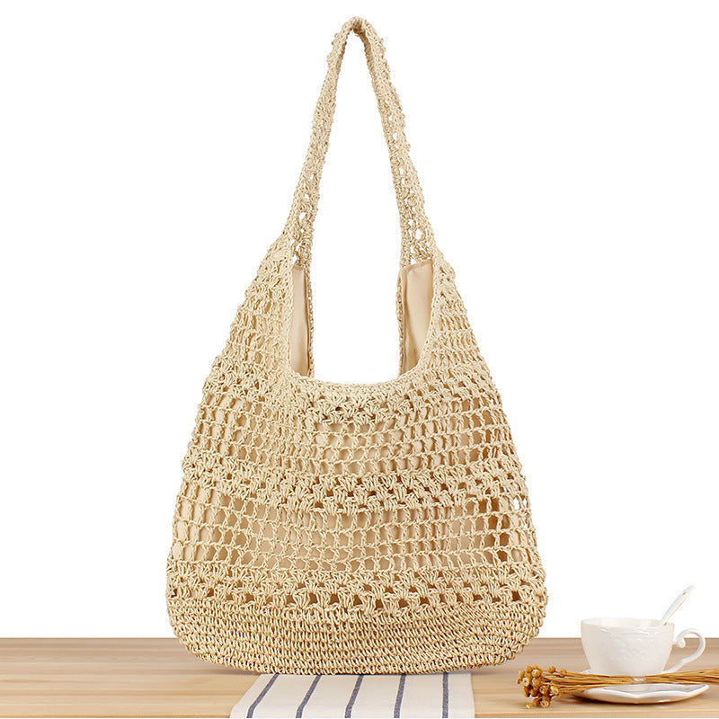 Handbag with floral appliqué in natural material Skanto