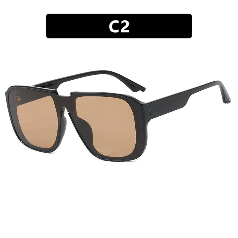 Women's trendy square sunglasses with transparent green frame and protective UV filter Skanto