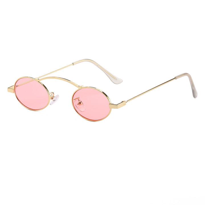Dame moteriktig solbrille med unike sirkulære rammer og karakteristiske linser Skanto