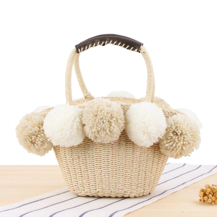 Basket bag with pompom decorated top Skanto