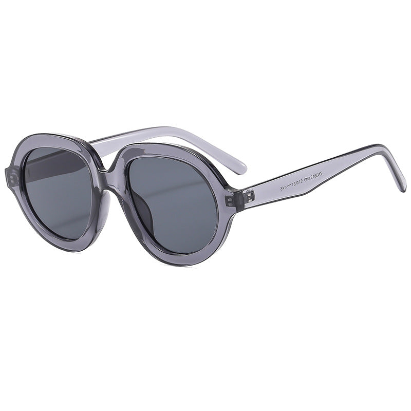 Dame trendy solbriller med bred, oval ramme Skanto