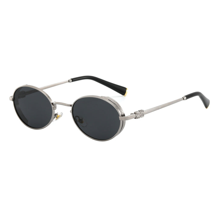 Dame Runde Designer-solbrille med elegant metallramme Skanto