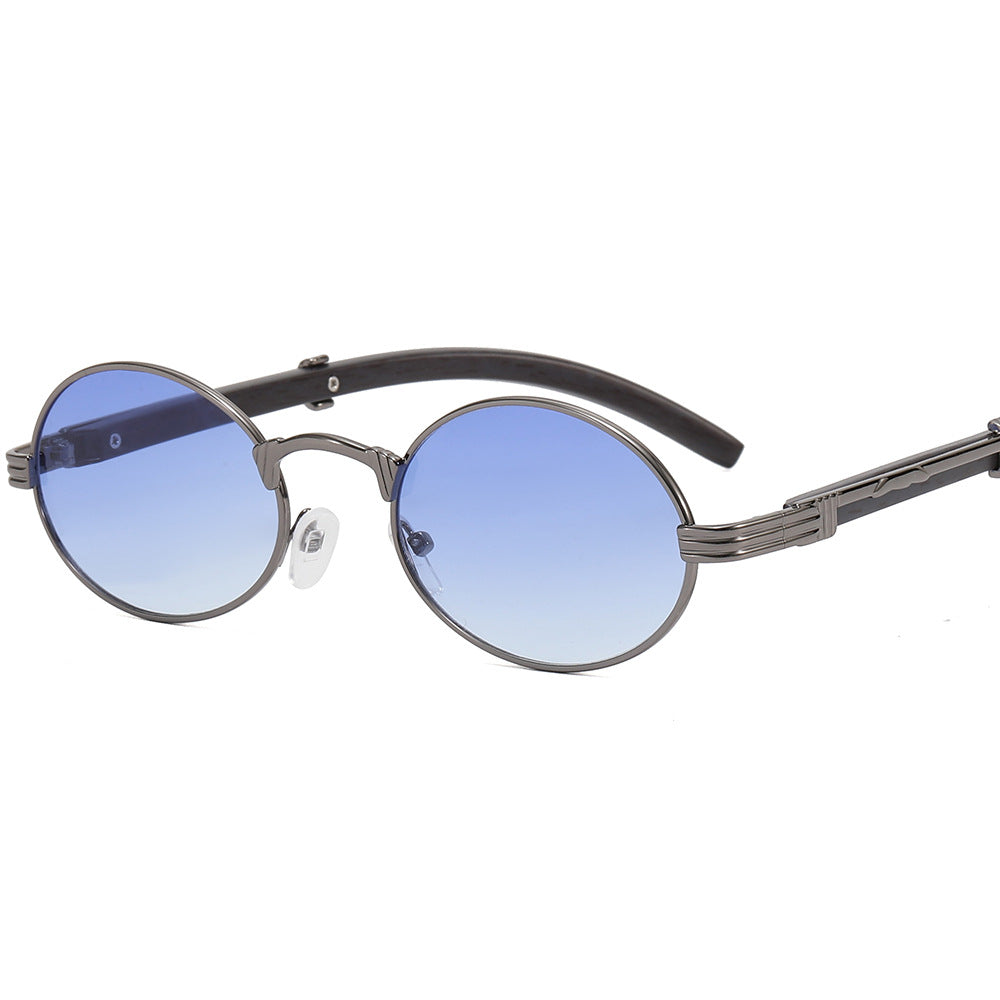 Dame rund designer solbrille med innovativ metallramme Skanto